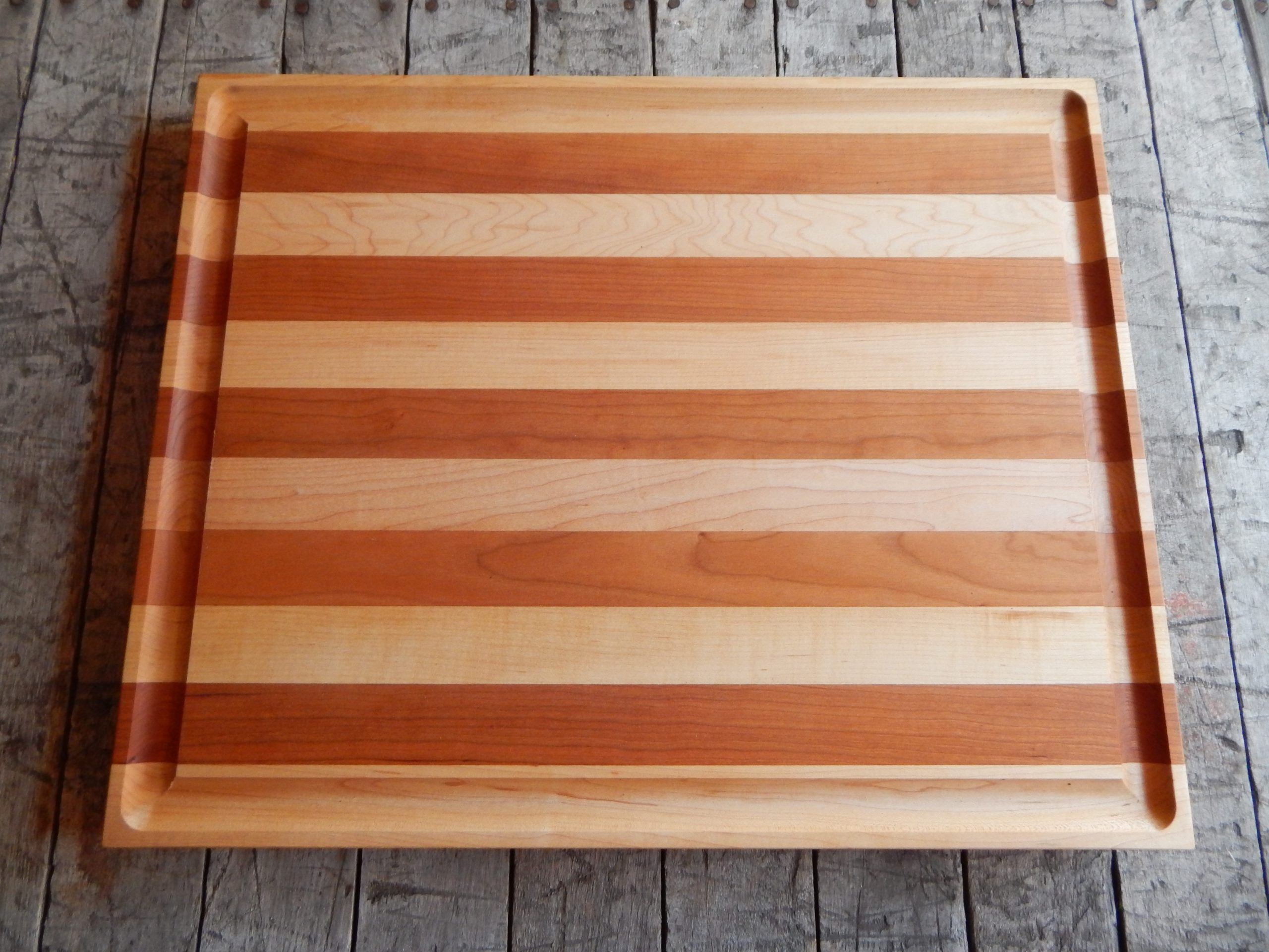 https://www.eastbaycuttingboards.com/wp-content/uploads/2020/09/cherry-maple-trough-scaled.jpg